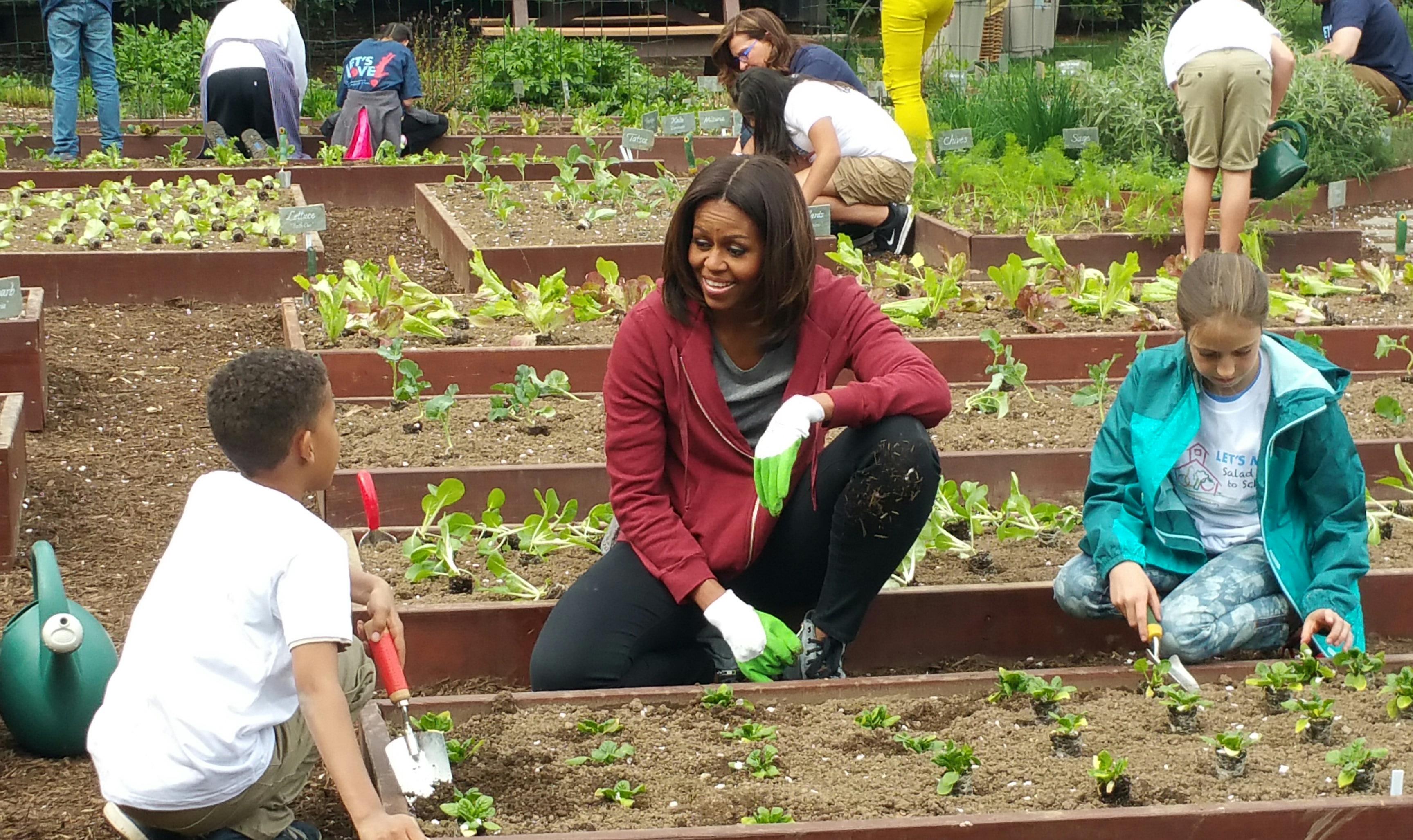 First lady Michelle Obama joins students from across the nation to plant the White House Kitchen Garden on April 15, 2015 (photo credit: Jerome Dorn)